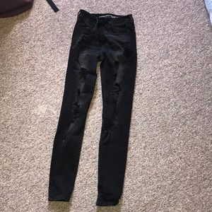 Holy black jeans ripped but good condition